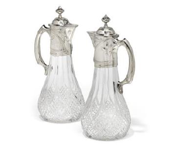 A Pair Of Art Nouveau Wine Jugs From Germany by 
																	 Bruckmann & Söhne