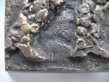 Bronze relief by 
																			Knud Nellemose
