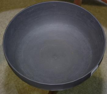 A wedgwood black basalt bowl. by 
																			Keith Murray