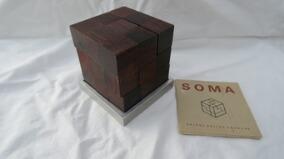 Soma Cube of solid rosewood by 
																			Piet Hein