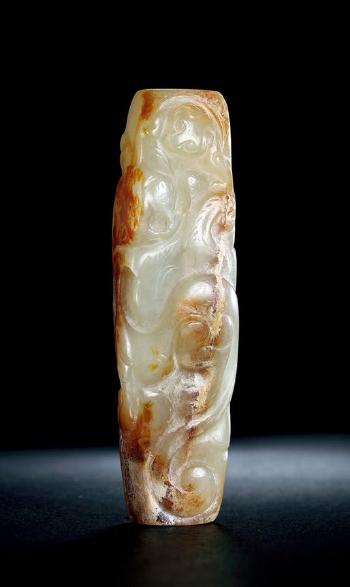 A White and Russet Jade Finial by 
																	 Han Dynasty