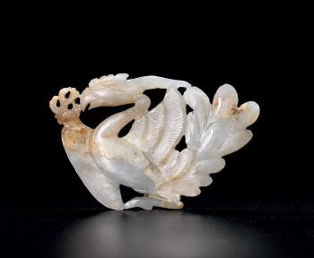A White Jade 'Phoenix' Pendant by 
																	 Tang Dynasty