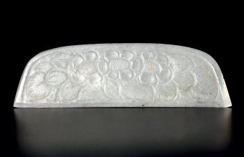 A White Jade 'Floral' Comb-Back by 
																	 Tang Dynasty