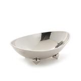 Oval sterling silver bowl with hammered surface. On four feet by 
																			Karl Gustav Hansen