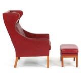 Wingback chair and stool with teak legs by 
																			Erik Kolling Andersen