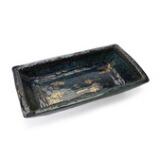 A large, rectangular earthenware dish with embossed relief decor by 
																			Bjorn Wiinblad