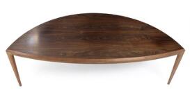 Tre-legged organic shaped rosewood coffee table by 
																			 CFC Silkeborg (Co.)