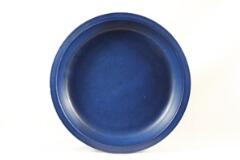Circular stoneware dish by 
																			 Saxbo Co