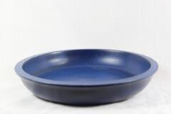 Circular stoneware dish by 
																			 Saxbo Co
