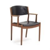 A Patinated Oak Armchair, Upholstered In Seat And Back With Black Leather by 
																			Poul M Volther