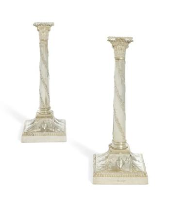A Pair of Victorian Silver Candlesticks by 
																	 Walker and Hall