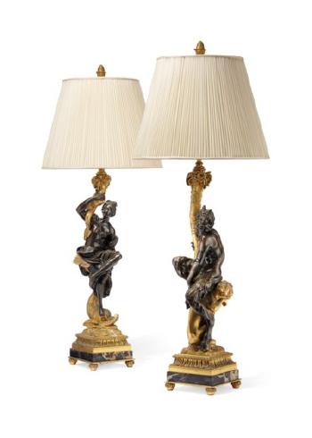 A Pair Of American Gilt And Patinated Bronze And Portor Marble Figural Lamps by 
																	 Edward F Caldwell & Co