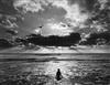 Untitled (Beach Scene, With Flying Figures) by 
																			Jerry Uelsmann