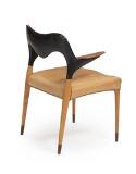 Armchair with beech legs and teak shoes and armrests by 
																			 J L Moller