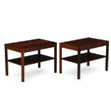 A pair of rosewood side tables with underlying shelf by 
																			 Andreas Tuck