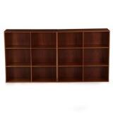 A pair of bookcases of solid mahogany by 
																			Mogens Koch