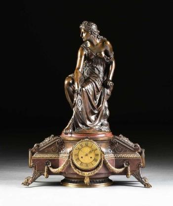 Figure, on a neo Grec mantle clock base by 
																			Etienne-Henri Dumaige