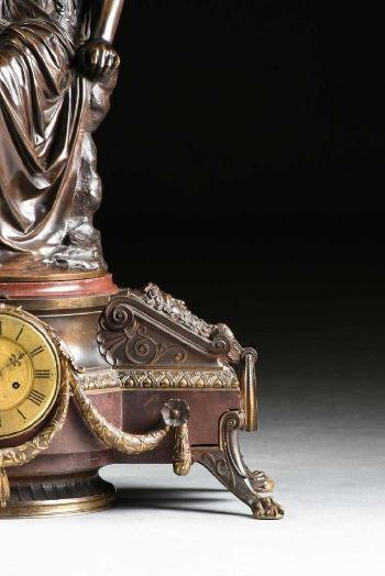 Figure, on a neo Grec mantle clock base by 
																			Etienne-Henri Dumaige