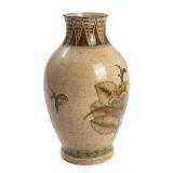 A stoneware vase decorated with flowers and ornamentation by 
																			Patrick Nordstrom