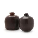 A pair of stoneware vases by 
																			 Saxbo Co