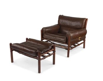 An Arne Norell Colombian Rosewood and Leather Upholstered Kontiki Chair and Ottoman Sweden by 
																	Arne Norell