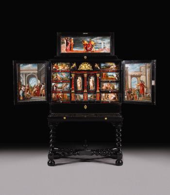 A Flemish ebony cabinet (Kunstkast) with painted panels by 
																	 Veronese & Fetti