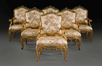A set of six Italian giltwood and polychrome painted armchairs by 
																	 Unknown Furniture Maker