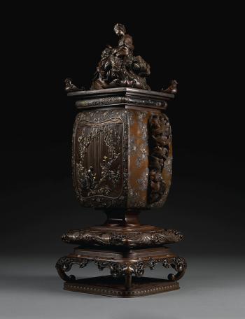 A fine soft-metal-inlaid bronze vase by 
																	Oshima Yasutaro