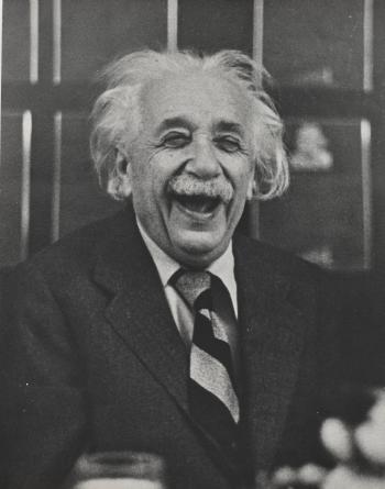 Einstein laughing, Princeton University, New Jersey by 
																	Ruth Orkin
