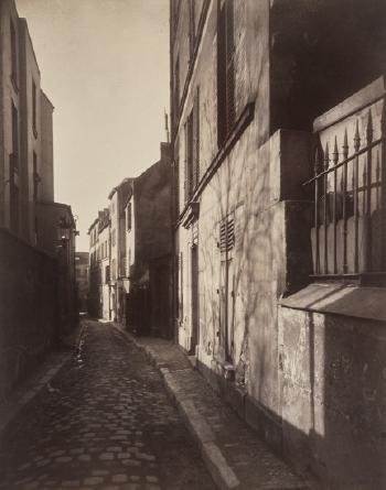 Rue St. Rustique, Montmartre by 
																	Eugene Atget