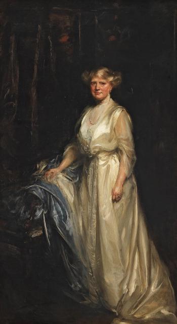 Portrait of a lady, standing full-length, in a cream dress, resting her right hand on a chair by 
																	James Jebusa Shannon