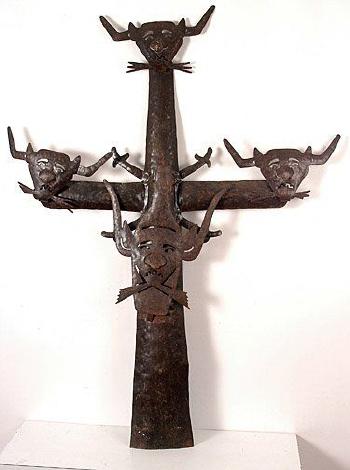 Cross with devil heads by 
																	Serge Jolimeau