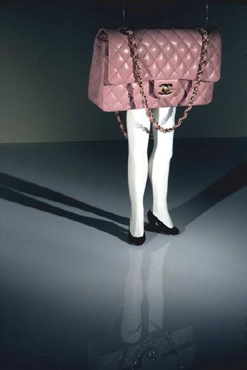 Walking Chanel Purse by 
																	Laurie Simmons