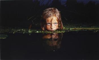 Girl in a swamp by 
																	Oleg Kulik