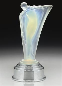 An opalescent glass figure by 
																	Edmond Etling